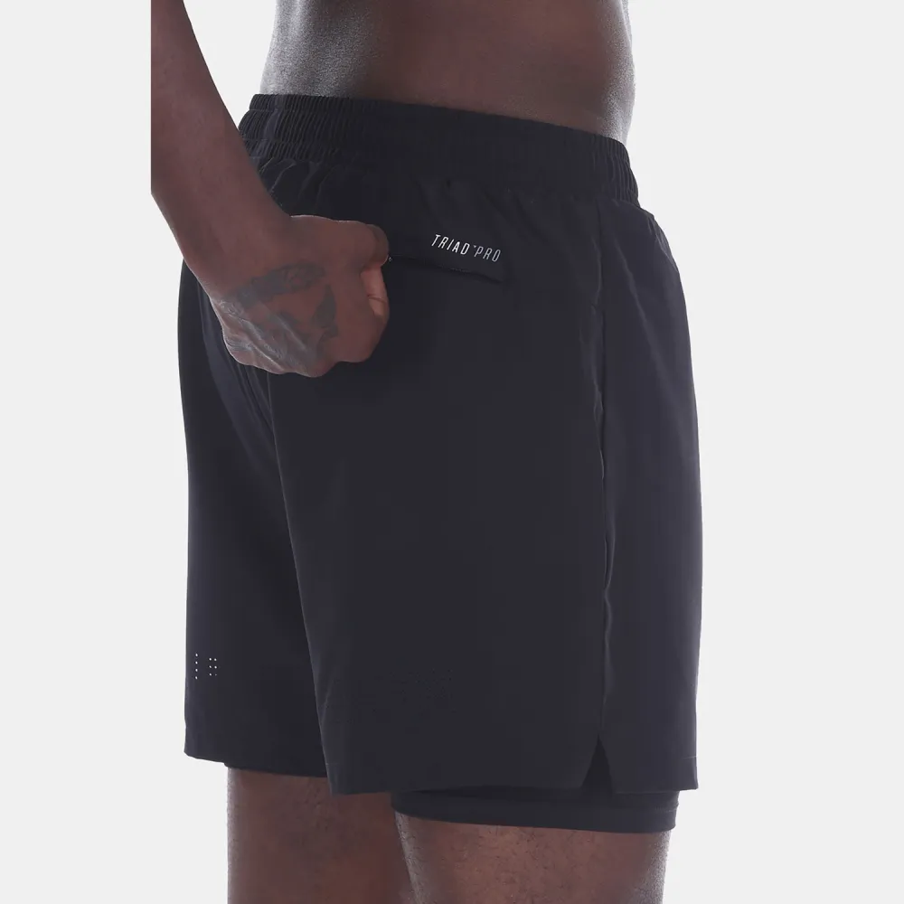 MAGNETIC NORTH 2 IN 1 PERFORMANCE SHORTS
